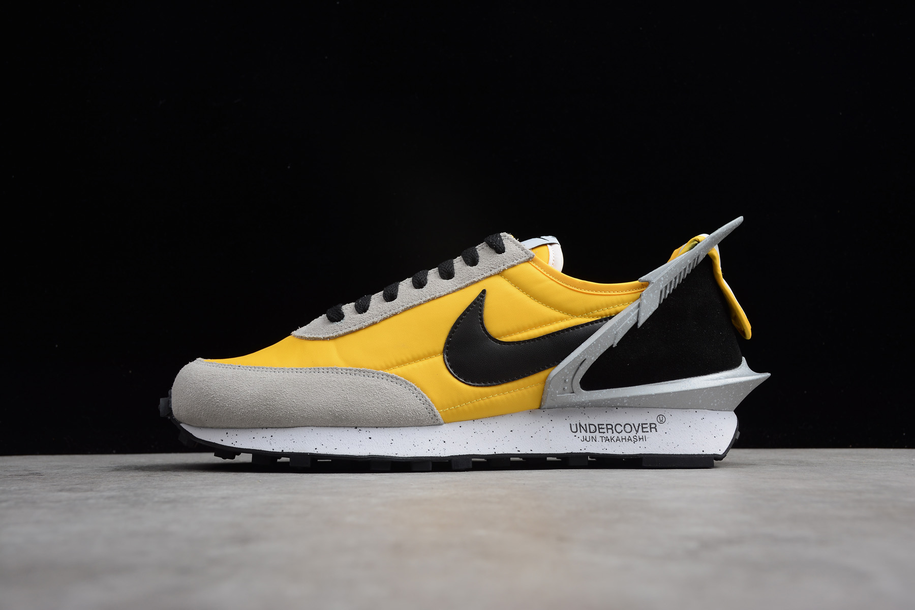 yellow black nike shoes